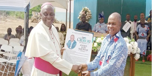 Most Rev. Joseph Afrifa Agyekum (left) presenting a citation to Justice Kofi Akrowiah at the ceremony Most Rev. Joseph Afrifa Agyekum (left) presenting a citation to Justice Kofi Akrowiah at the ceremony